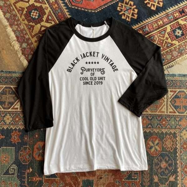 ‘Purveyors’ 3/4 Raglan Sleeve Baseball Tee.