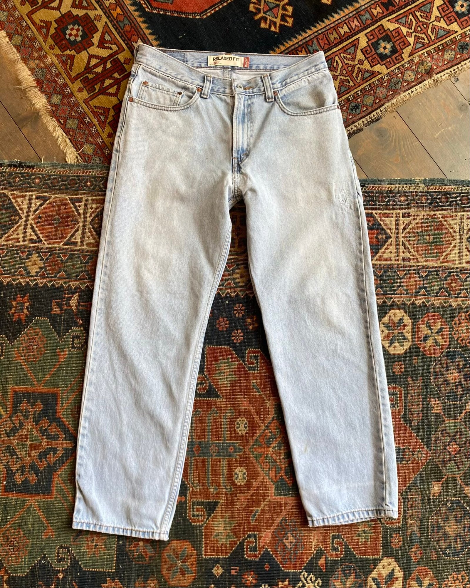Levi’s 550 Bleach Wash Distressed & Repaired Jeans. 32” W/30” L.